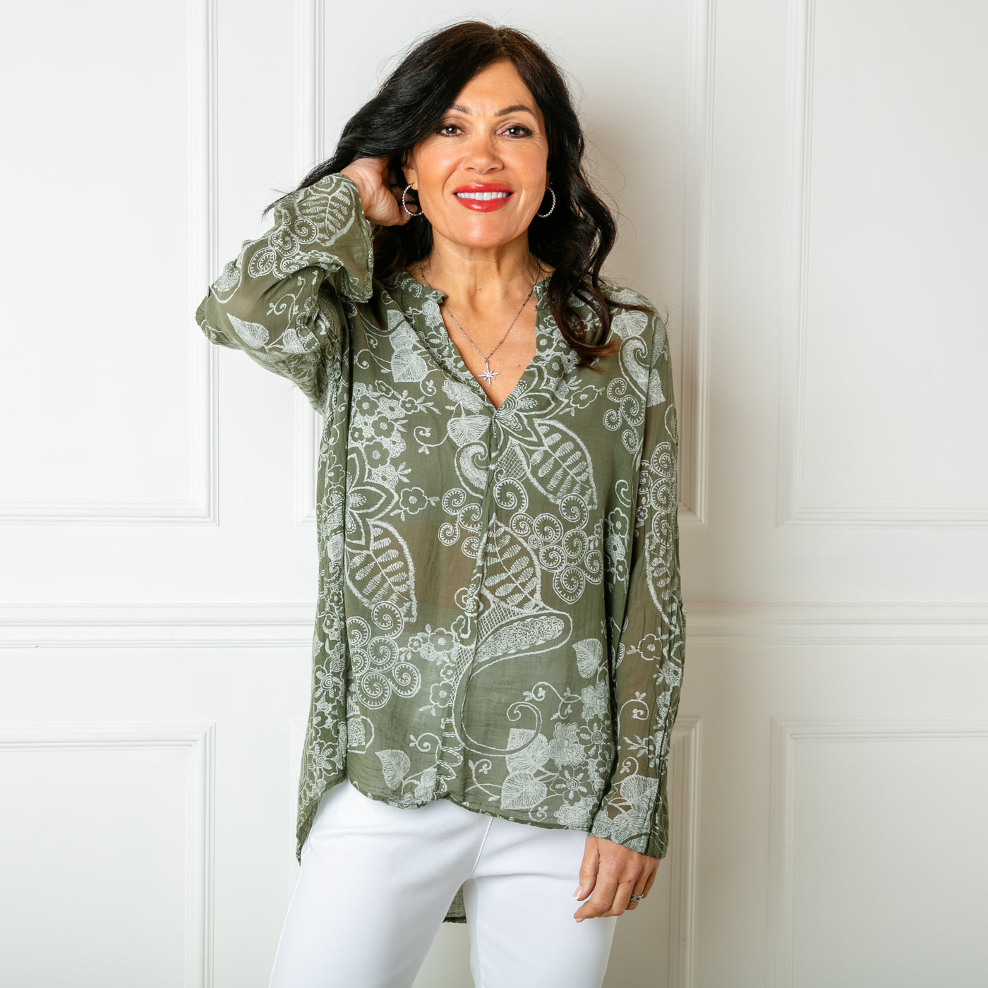 The khaki green Botanical Cotton Blouse in a beautiful floral paisley print with white accents