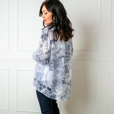 The white Botanical Cotton Blouse in a beautiful floral paisley print with navy blue accents