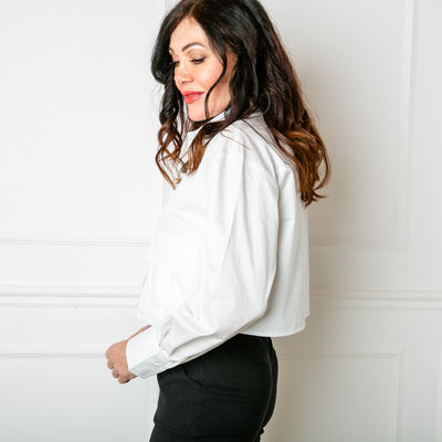 The Boxy Cropped Shirt in white in a shorter cropped length, perfect for layering a jumper to cardigan over the top