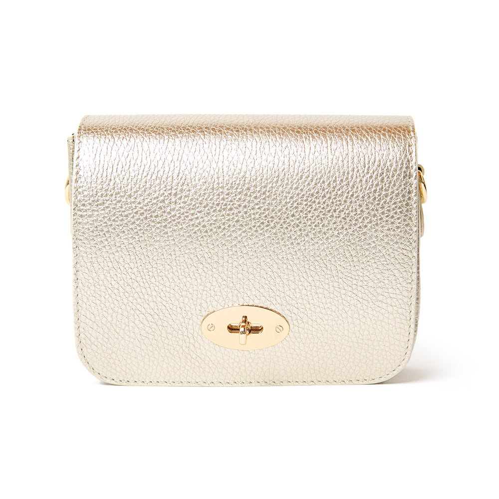 The gold metallic Buckingham Leather Handbag which features a twist clasp fastening in gold metal hardware