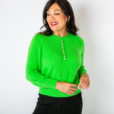 The lime green Button Crew Alpaca Jumper with long sleeves and a round crew neckline