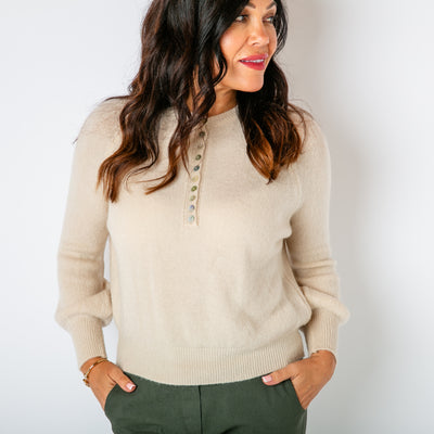 The oatmeal cream Button Crew Alpaca Jumper with long sleeves and a round crew neckline