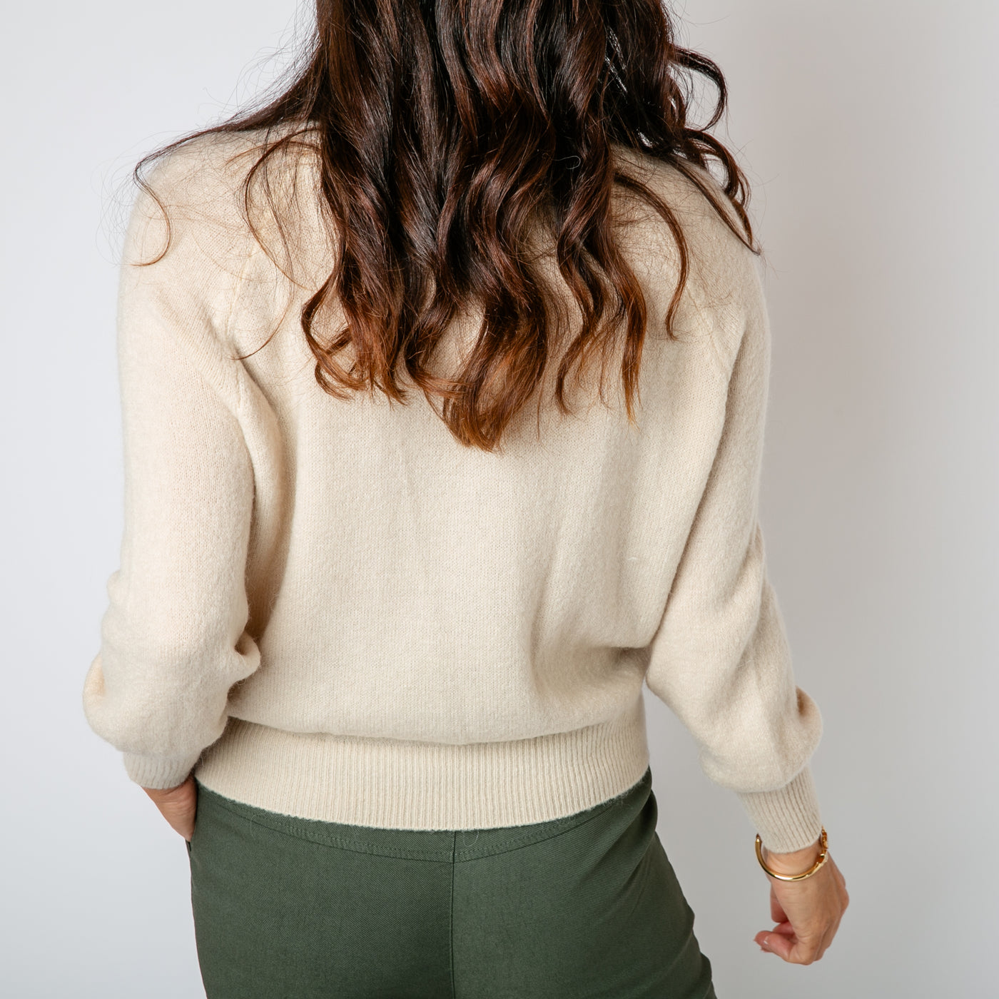 The oatmeal cream Button Crew Alpaca Jumper with an iridescent button detail down the front