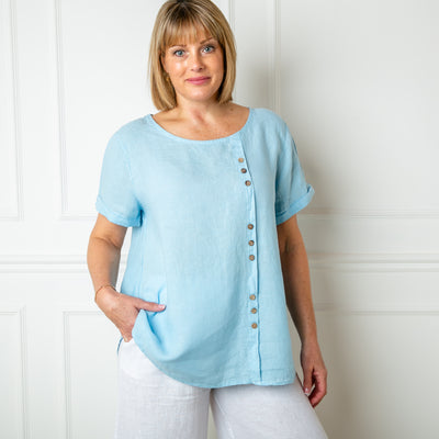 The baby blue Button Down Linen Top with short sleeves and a round neckline