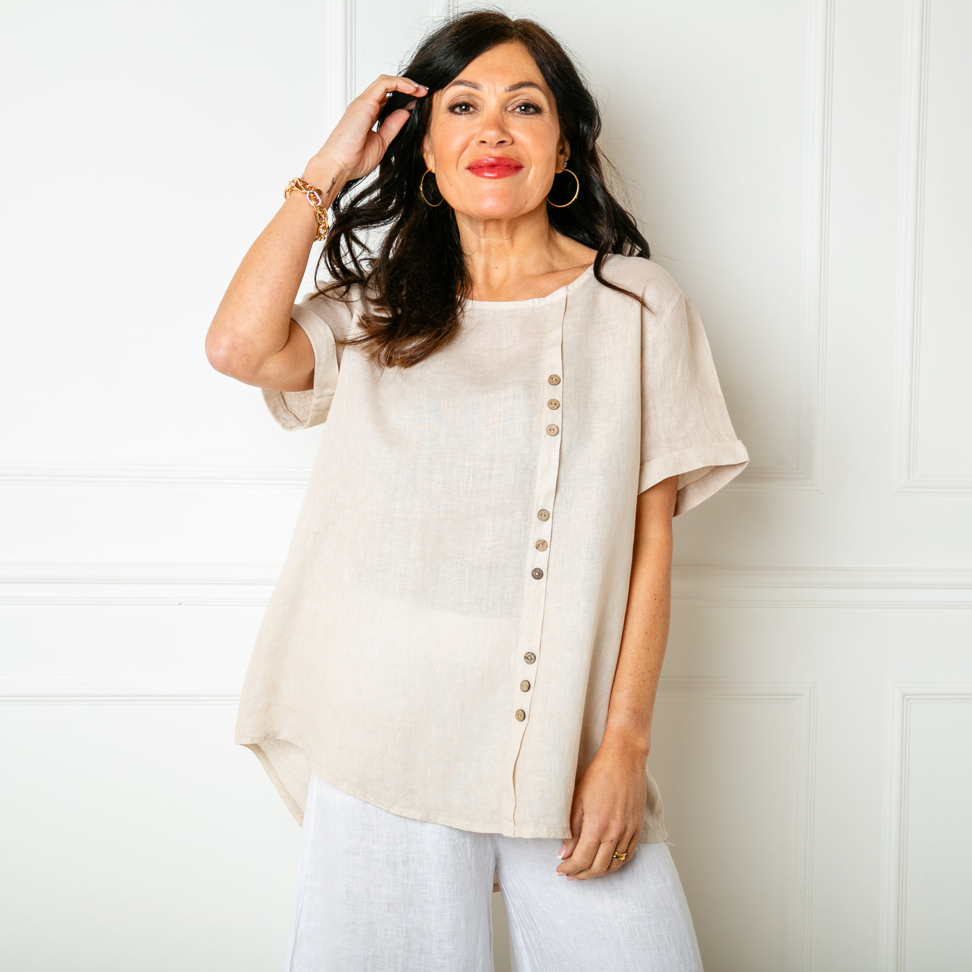 The natural cream stone Button Down Linen Top with short sleeves and a round neckline