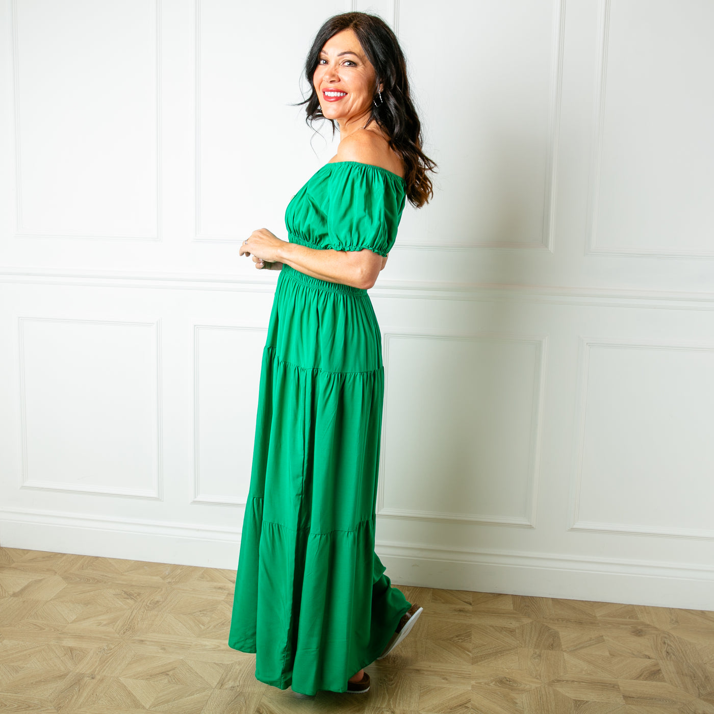 The emerald green Button Front Maxi Dress with a tiered maxi skirt, perfect for your summer holiday