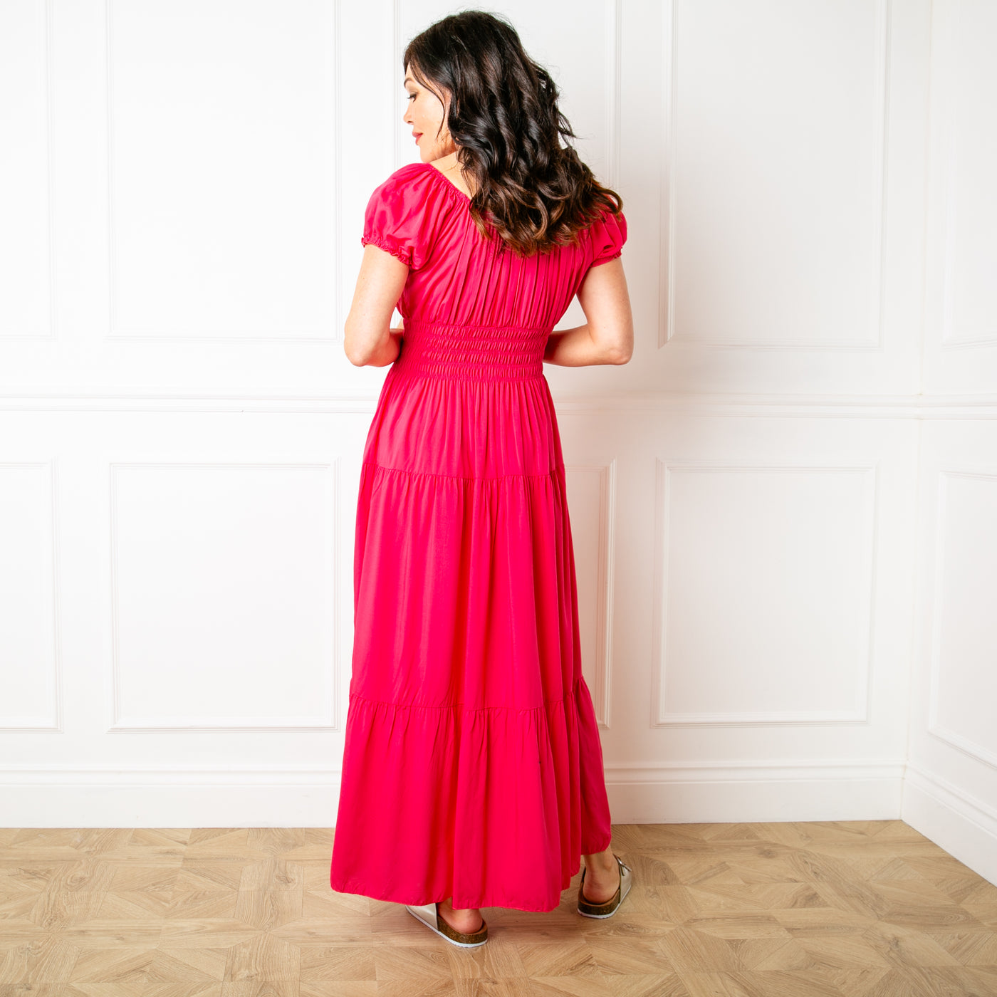 The fuchsia pink Button Front Maxi Dress with a tiered maxi skirt, perfect for your summer holiday