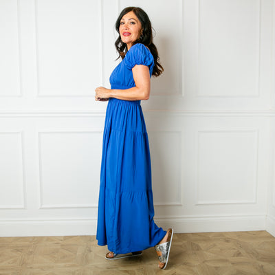 The Button Front Maxi Dress in royal blue with button detailing down the front and a shirred elasticated stretchy waistband 