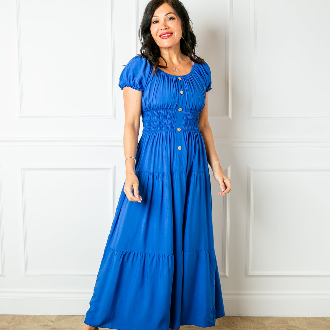 The royal blue Button Front Maxi Dress with short puffy sleeves that can be worn on or off the shoulder