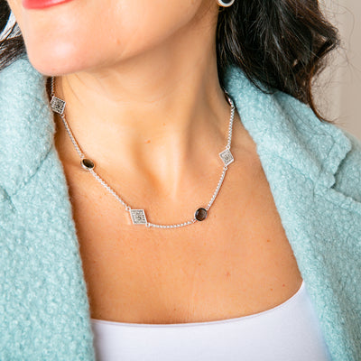 The Camilla Necklace in silver with a snake chain that can be adjusted to the desired length