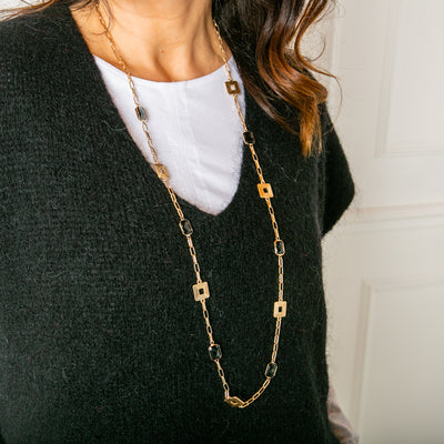 Casey Necklace in gold and black  with a fine wide hoop chain and an extender to adjust to desired length