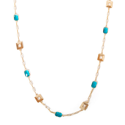 Casey necklace in gold with turquoise blue pendants and square metal pendants spread across the chain