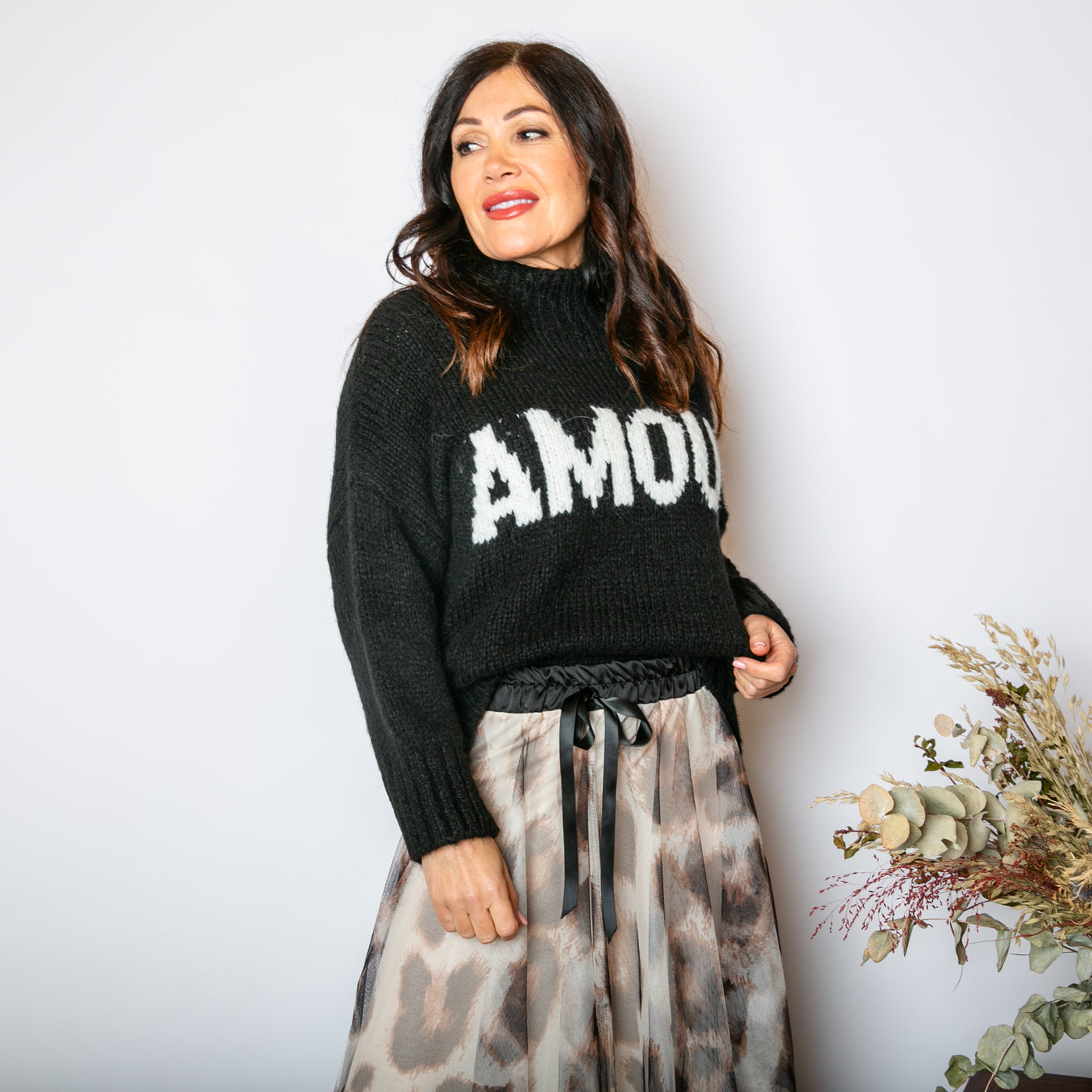 The black Chunky Slogan Jumper with cream writing across the front to make a statement