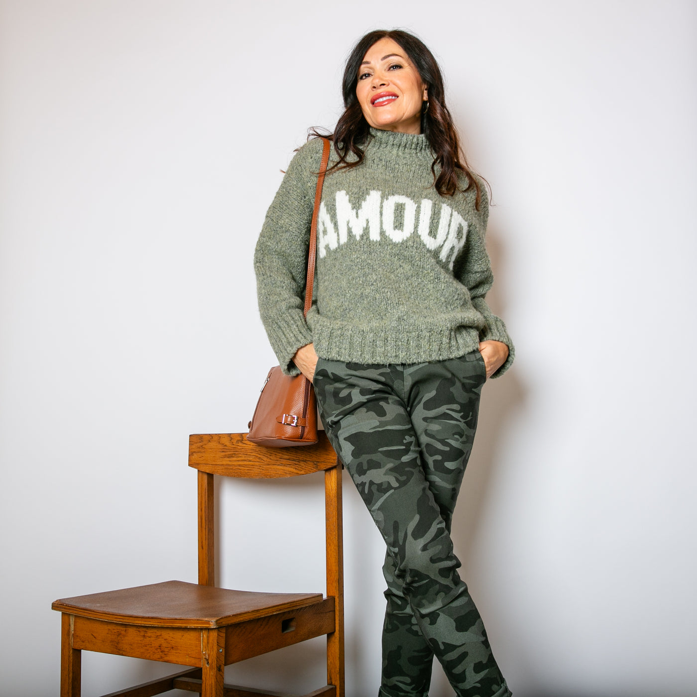 The khaki green Chunky Slogan Jumper with cream writing across the front to make a statement