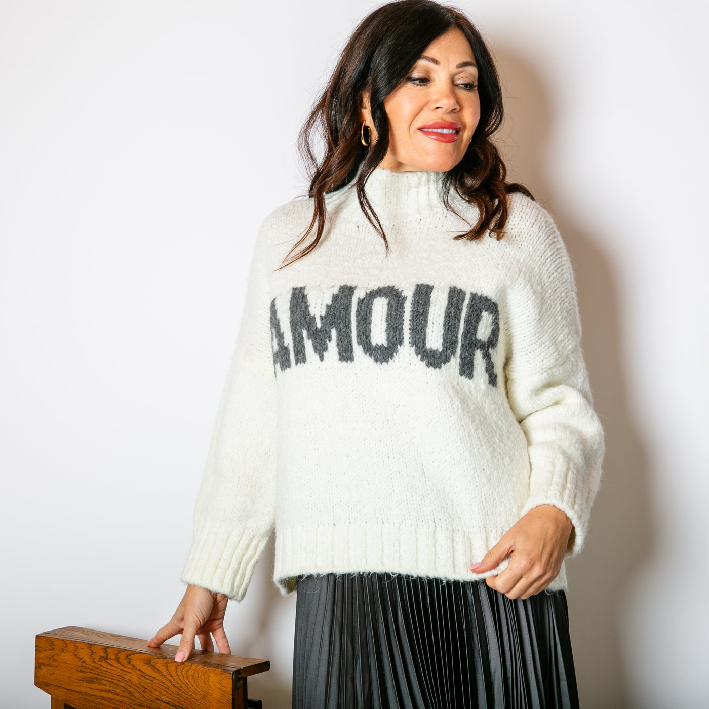 The white Chunky Slogan Jumper with grey writing across the front to make a statement