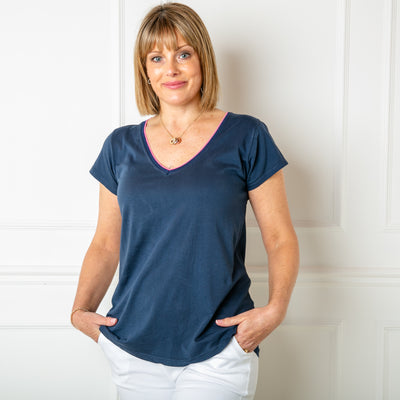 The Clashing T-shirt in navy blue with short sleeves and a v neckline