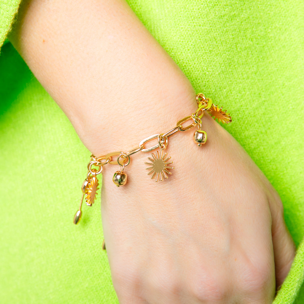 The gold Coco Bracelet with a drawstring chain fastening to adjust to desired length