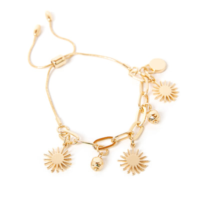 The gold Coco Bracelet featuring gorgeous sun charms on a wide link chain