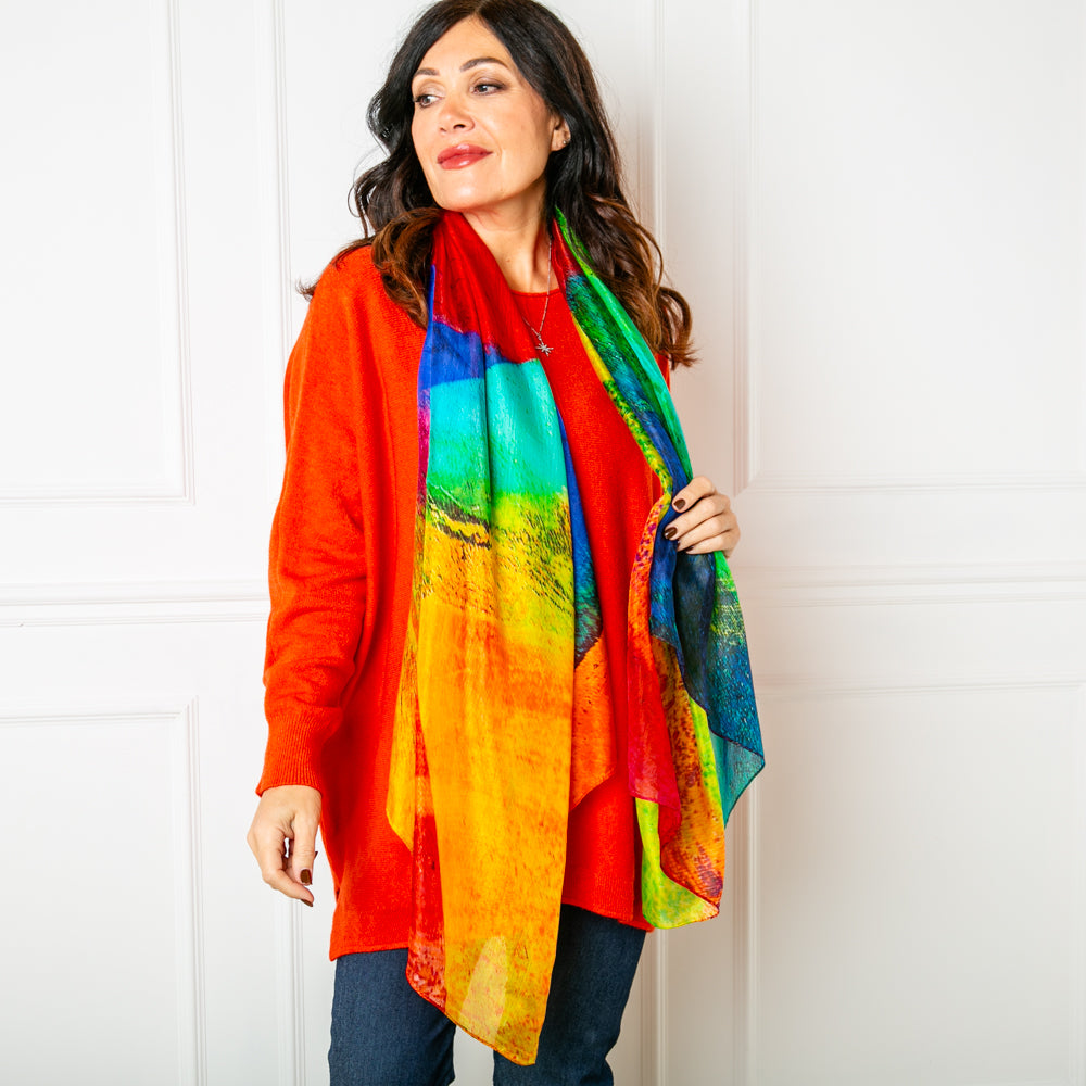The Colour Spectrum Silk Scarf which can be worn in lots of different ways
