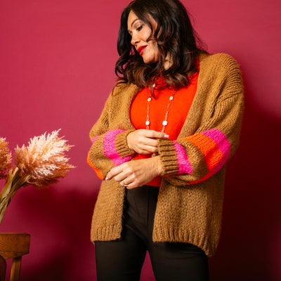 The biscuit brown Contrast Stripe Cardigan with hints of orange and pink on the sleeves