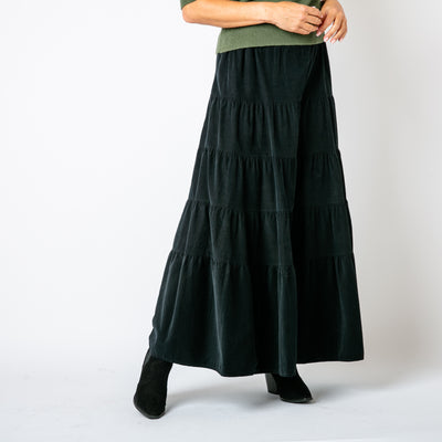 The Cord Tiered Skirt in black made from 100% cotton corduroy, soft to the touch