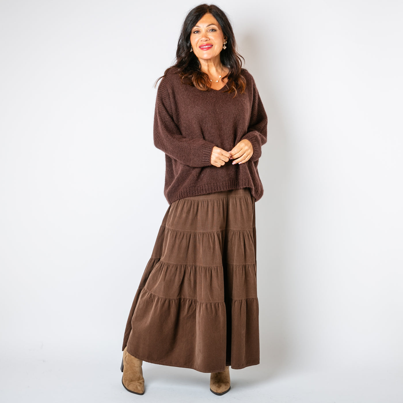 The Cord Tiered Skirt in chocolate brown with a tiered circle skirt in a maxi length