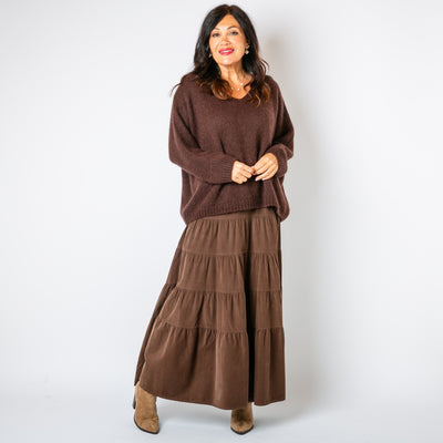 The Cord Tiered Skirt in chocolate brown with a tiered circle skirt in a maxi length