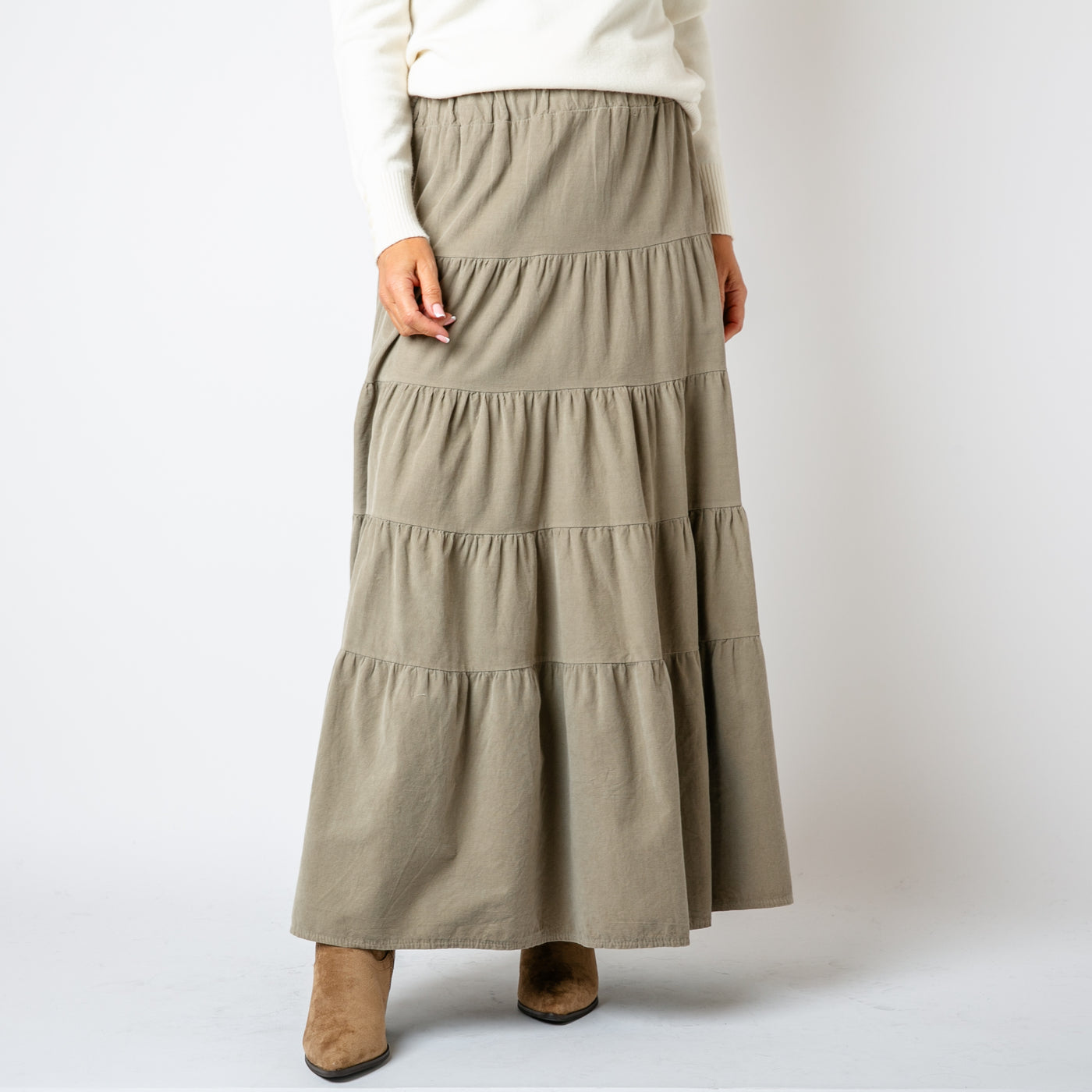 The Cord Tiered Skirt in stone cream beige with a tiered circle skirt in a maxi length