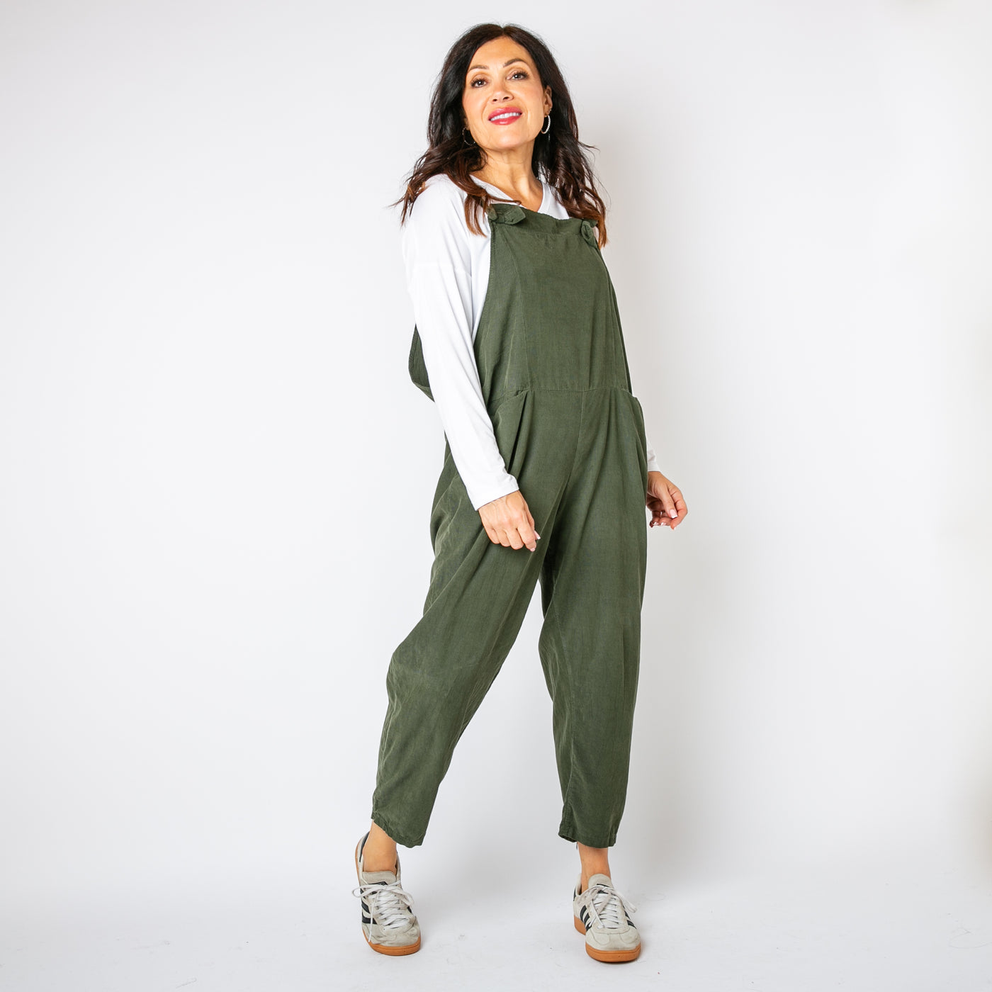 The khaki green Corduroy Dungarees with tie up straps that can be adjusted to desired length