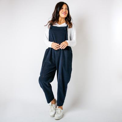 The navy blue Corduroy Dungarees with large pockets on either side of the hip