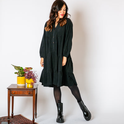 The Corduroy Tiered Dress in black made from soft 100% cotton 