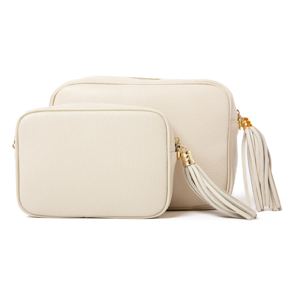 The cream Bloomsbury Italian leather handbag compared with the smaller Chichester leather handbag 