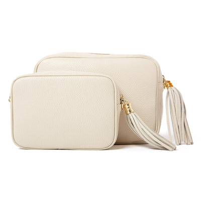 The Cream Chichester leather handbag next to the Bloomsbury leather handbag which is the same but larger in size
