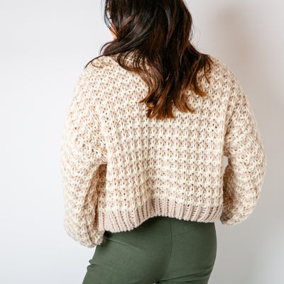 The stone cream Cropped Chunky Knit Cardigan with ribbed detailing around the cuffs opening and bottom hemline