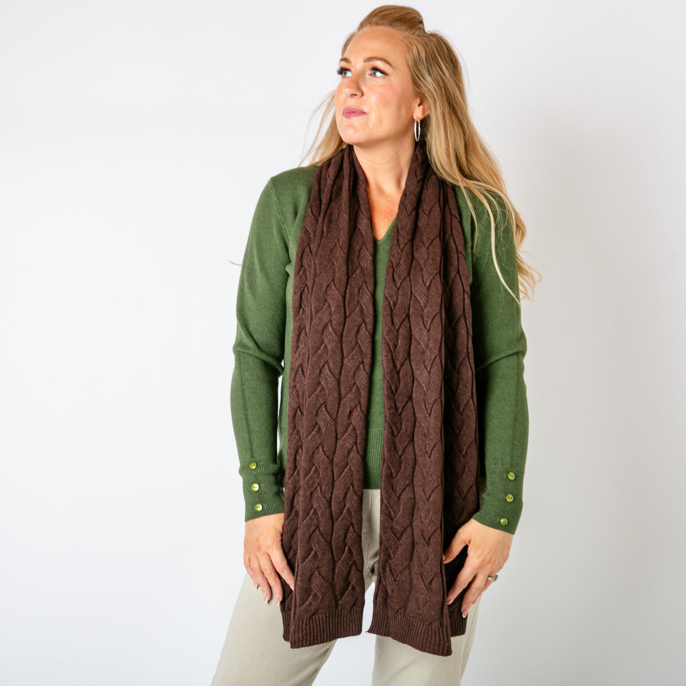 The chocolate brown Daphne Cable Knit Scarf which is super soft and perfect for chilly days