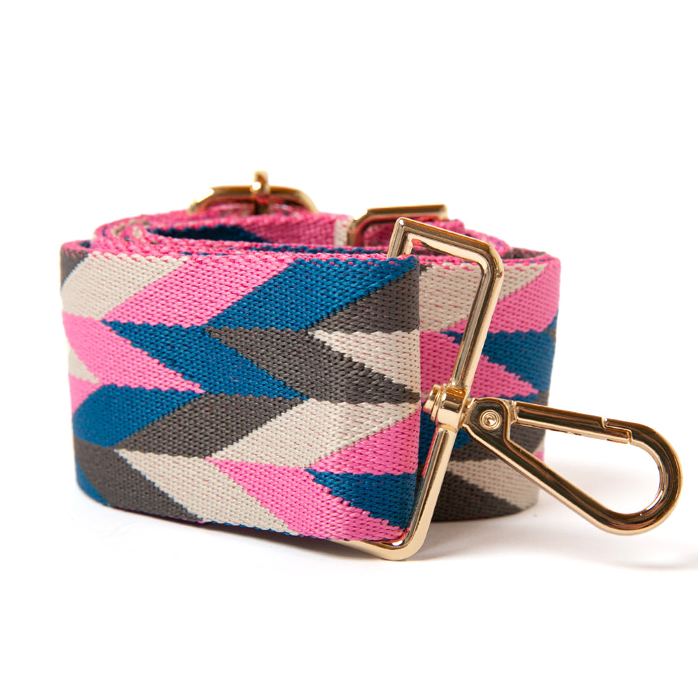 Fully adjustable detachable bag strap in pink blue geometric pattern, with gold hardware. Perfect for adding a unique touch to any bag