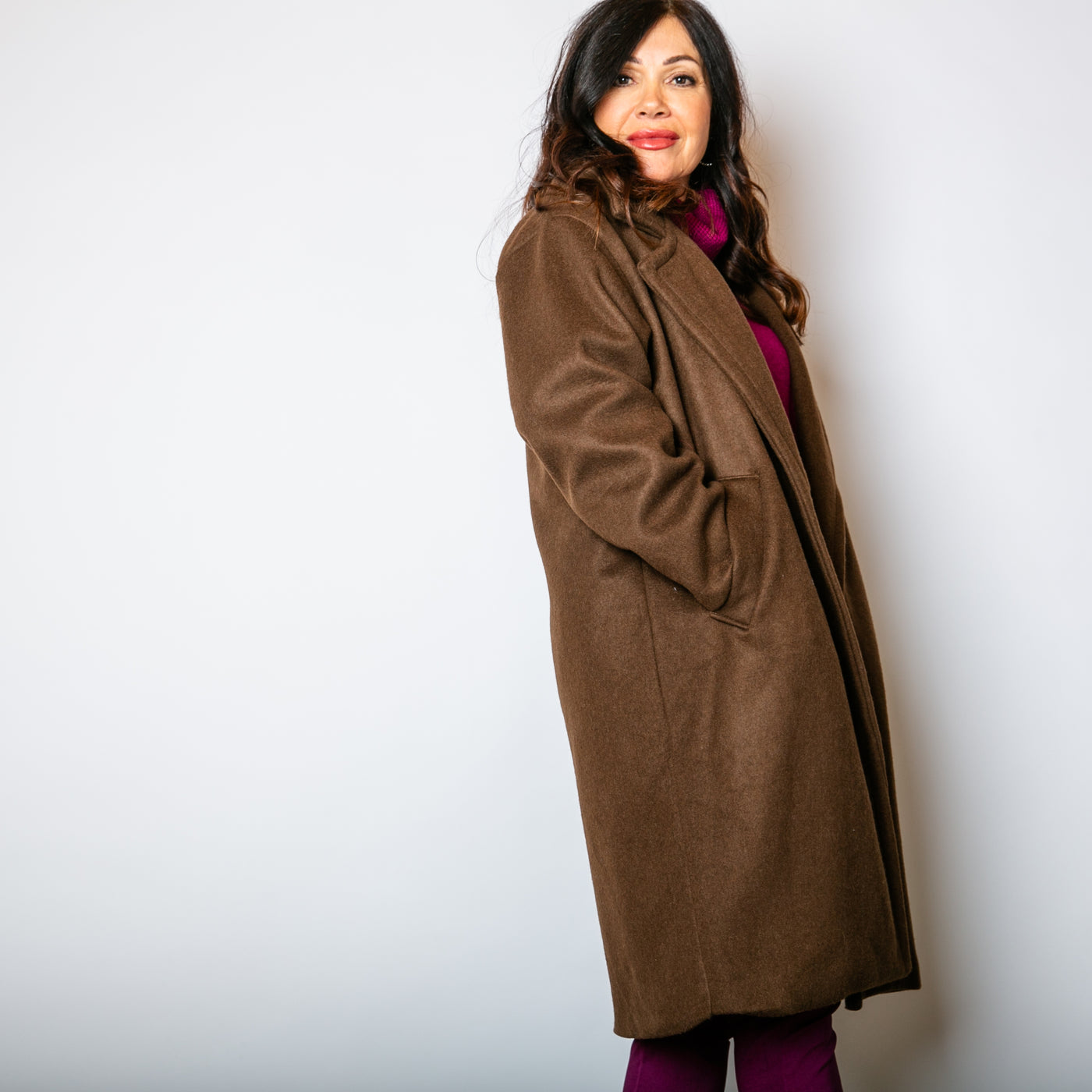 The chocolate brown Double Faced Coat with long sleeves and a longline silhouette