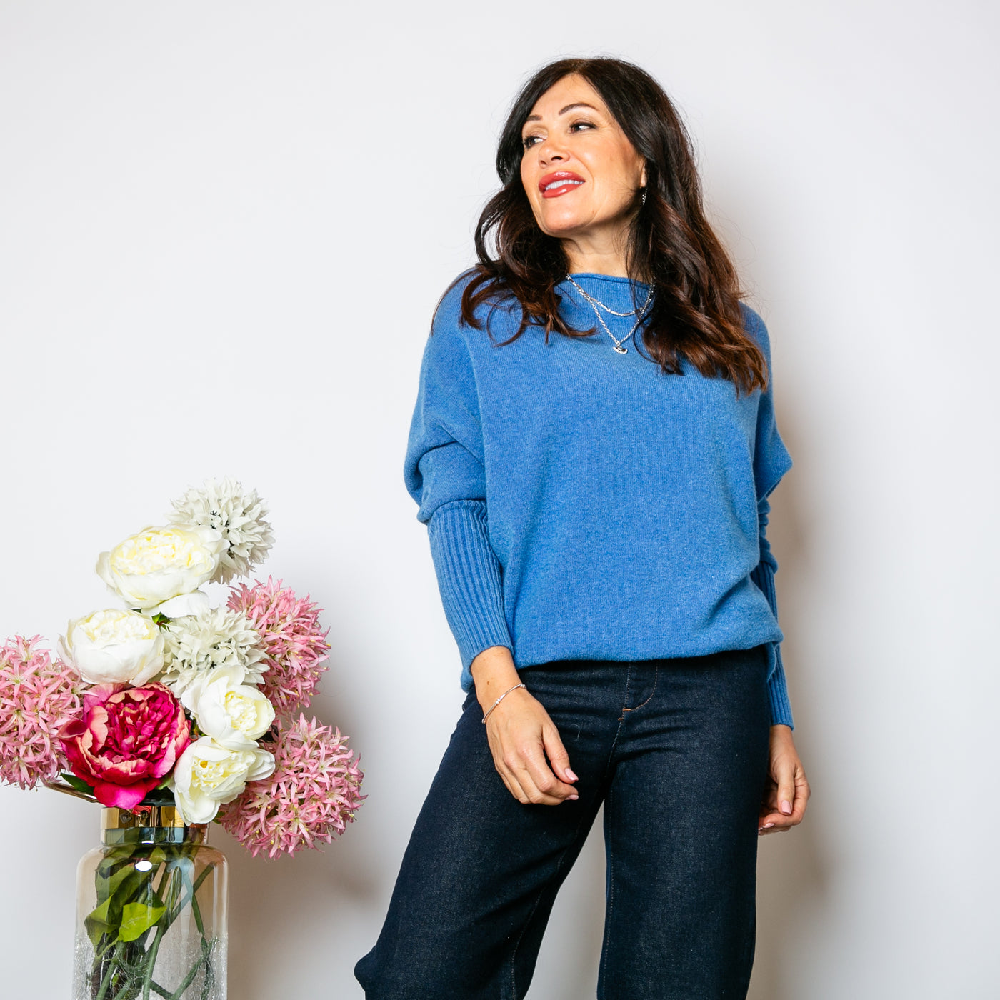 The Drop Sleeve Jumper in denim blue made from a super soft stretchy material perfect for winter