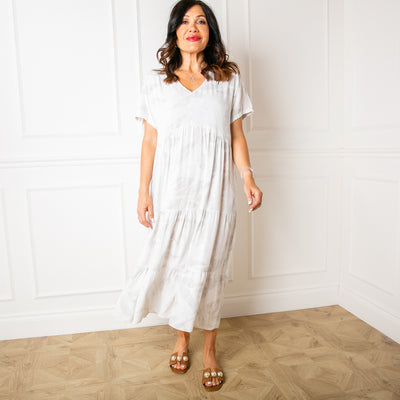 The Eden Dress in white made from a lightweight material perfect for summer in a leaf pattern