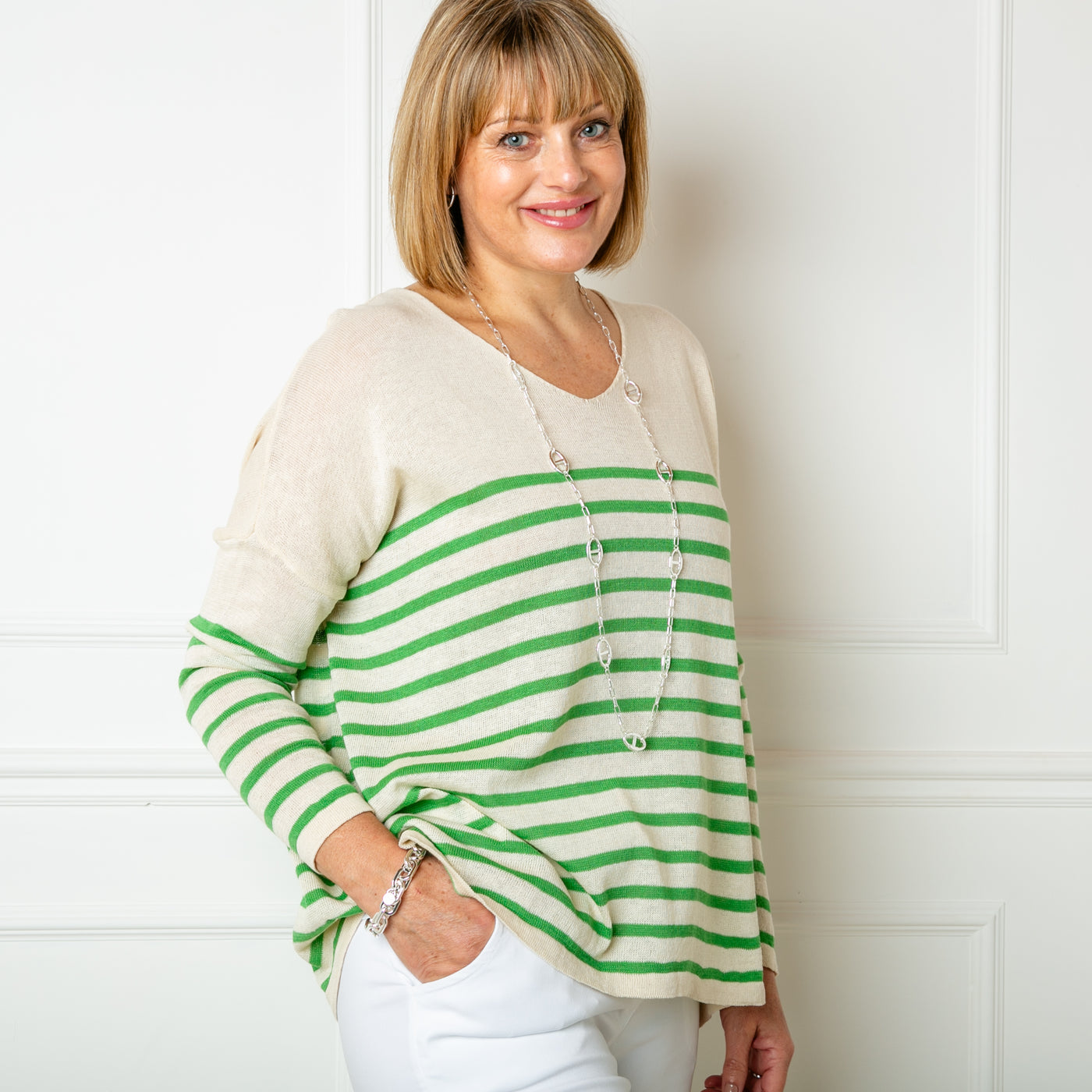 The emerald green Fine Knit Stripe Jumper with long sleeves and a v neckline