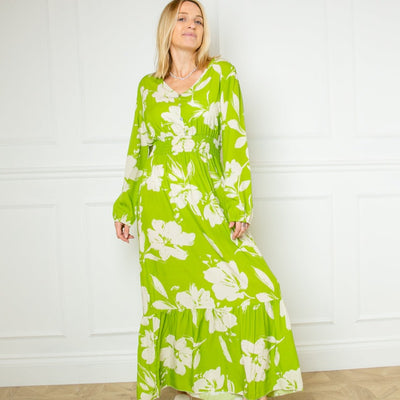 The lime green Floral Print Maxi Dress with a v neckline and long sleeves elasticated at the cuff