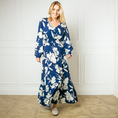 The navy blue Floral Print Maxi Dress with elasticated detailing around the waist for a flattering fit