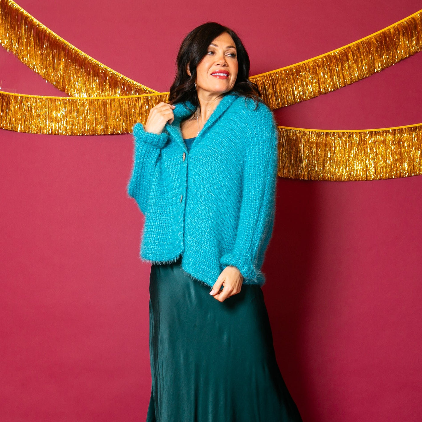 The aqua blue Fuzzy Collar Cardigan with a cosy folded over collar