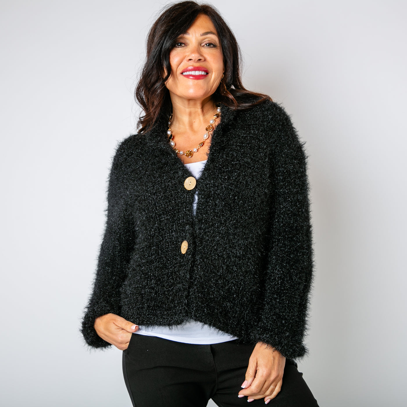 The black Fuzzy Collar Cardigan with a cosy folded over collar