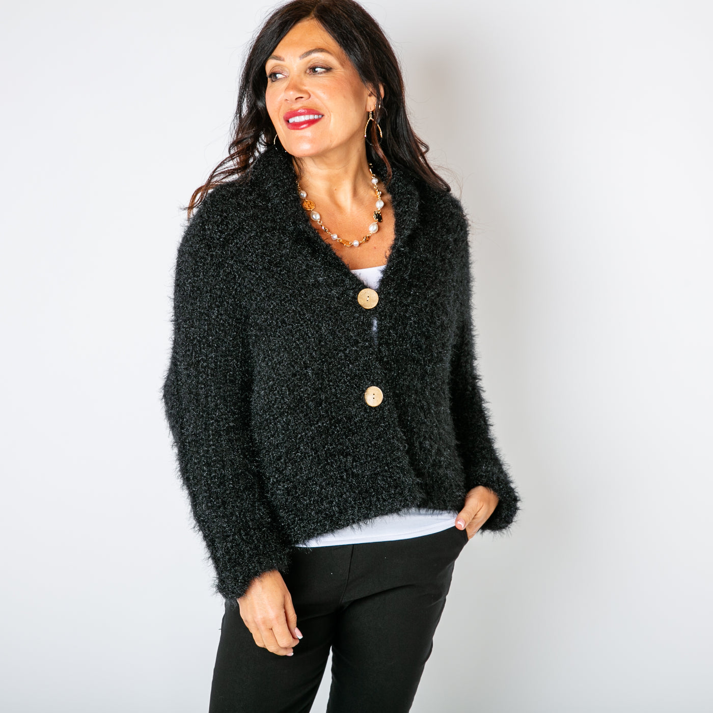 The black Fuzzy Collar Cardigan with long sleeves with a dropped seam