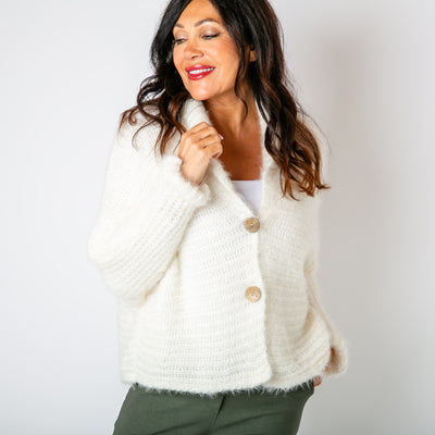 The cream Fuzzy Collar Cardigan with a cosy folded over collar