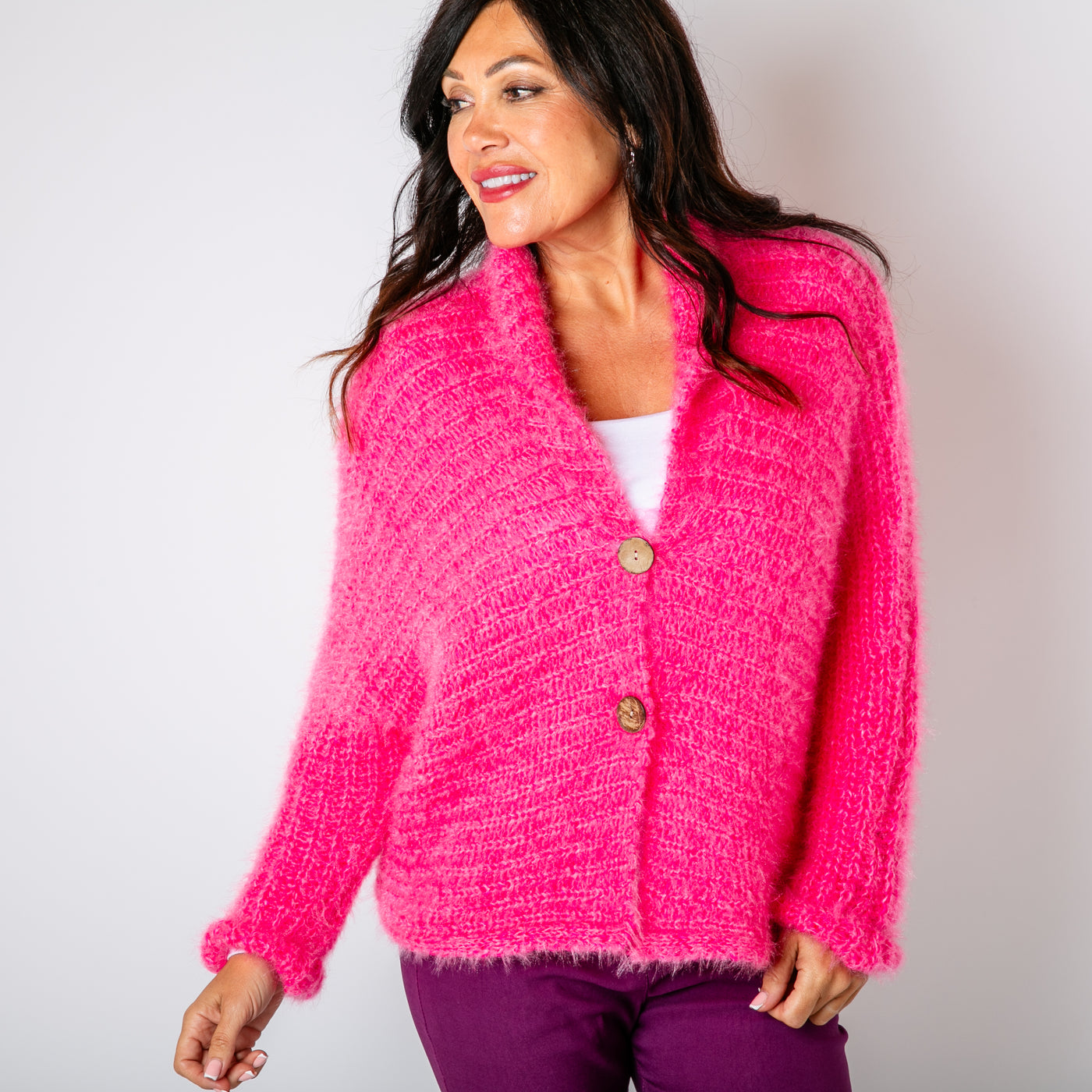 The fuchsia pink Fuzzy Collar Cardigan with a cosy folded over collar