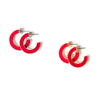 The Harlow Earrings available with silver or gold rims in fuchsia pink red with a butterfly back fastening