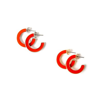 The Harlow Earrings available with silver or gold rims in orange with a butterfly back fastening