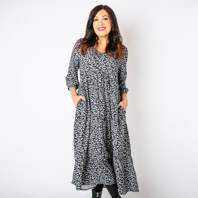 The charcoal grey Hazel Patterned 3/4 Sleeve Dress with stretchy elastic on the cuffs